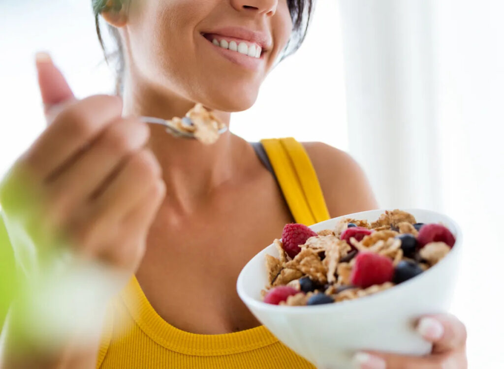 woman-eating-cereal-berries